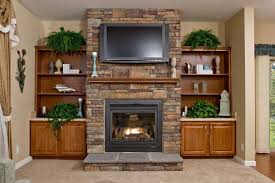 Stone Fireplace With Tv Above And Built In Shelves On Either Side Fireplace Shelves Fireplace Wall Foyer Decorating