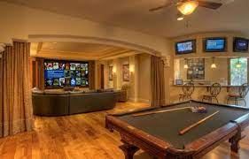 Indulge Your Playful Spirit With These Game Room Ideas Home Theater Design Media Room Design Billiard Room