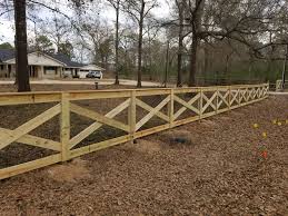 If containment is needed, fence doctor installs a 14 gauge, vinyl coated weld wire. Cross Buck Style Wood Fence Firstfenceoftexas Fence Landscaping Driveway Design Landscape Design