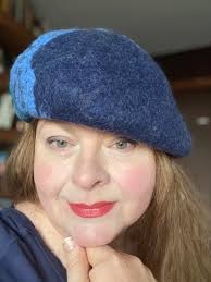 Hi all! I just wanted to introduce myself and share a photo that I took of  myself and a beret I made. I am a textile artist mostly working in wet  felting