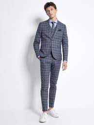 Le costume pour hommes à carreau constitue un excellent choix pour afficher un look moderne et élégant lors d'un diner ou d'un grand événement. Veste De Costume Homme A Carreaux