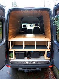After Using The Van With The Simple Platform For A Bed Table And Place To Hang Out F Minivan Camper Conversion Camper Van Conversion Diy Van Conversion Layout