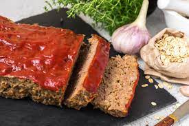 This Old Fashioned Meatloaf Contains Oatmeal Onion And A Little Garlic The Loaf Has A Simple Ketc Meatloaf With Oatmeal Good Meatloaf Recipe Savory Meatloaf