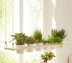 After planting, put your containers in a south or west facing area with plenty of windows to ensure the plants get enough sunlight. Home Dzine Garden Ideas Make A Hanging Herb Garden