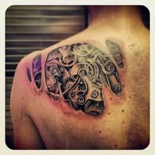 Black And Gray Realism Biomechanical Gears Back Backpiece Shoulder Blade Tattoo By Johnny Jinx At Broken C Tattoos Biomechanical Tattoo Cover Up Tattoos Shoulder tattoos are popular precisely because they're versatile in size and offer interesting placement choices. biomechanical tattoo