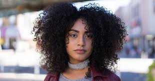Luscious locks with wispy bangs. Top Haircuts And Styles For Oval Faces Naturallycurly Com