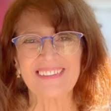 Tula exploring snow and bird seed outside window