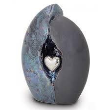 The word is literally formed from cremation and remains. Ceramic Medium Size Pet Cremation Ashes Urn Graphite And Grey With Silver Heart Motif