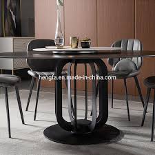 This is a perfect table no more chairs in the way the backs of the chairs in the way and it open up the room. China Industrial Factory With Turntable Metal Base Marble Round Dining Table Photos Pictures Made In China Com