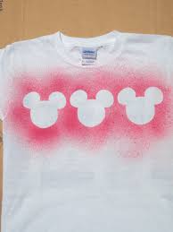 Make Your Own Spray Paint For Tee S Using Small Amount Of Fabric Paint And Water In Spray Bottles Disney Diy Crafts Diy Disney Shirts Disney Diy