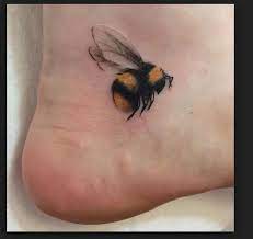 These tattoos look very appealing and innocent and can be designed in many types. Bee Tattoo Ankle Cute Small Spring Insect Honey Heel Tattoos Sleeve Tattoos For Women Body Art Tattoos