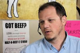 john-yoder-on-the-phone-at-Showalters-Meats-800×533-1