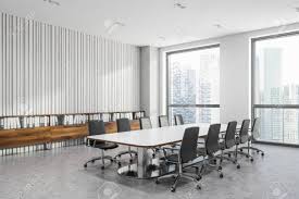 This modern rectangular conference table is a great option those who don't need a grommet hole. Corner Of Modern Office Meeting Room With White And White Wooden Stock Photo Picture And Royalty Free Image Image 123581438