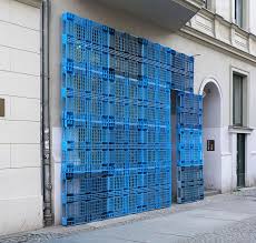 Borgman Lenk Jan Korbes Reconstruct Building Facade Using Plastic Pallets Facade Design Facade Retail Facade