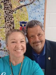 6th grade students make light up ornaments