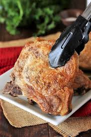 Pan Fried Pork Chop Being Plated With Black Tongs Image In 2020 Pan Fried Pork Chops Fried Pork Chops Pork