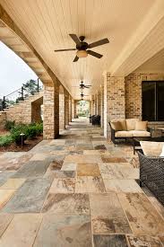 Terrace Level Patio With Stone Flooring And Tongue And Groove Ceiling Cardinal Construction Inc Duluth Ga Patio Patio Flooring Traditional Exterior