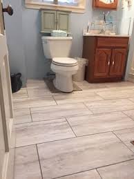 Style Selections 12 In X 24 In Groutable Oyster Travertine Peel And Stick Luxury Vinyl Tile Lowes Com Vinyl Tile Groutable Vinyl Tile Luxury Vinyl Tile