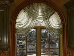 Arched windows can add light, beauty, and style to any room. Swags Arched Window Treatments Window Treatment Styles Curtains For Arched Windows