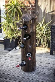 Diy Log Projects Can Be Very Creative And Can Give Warm In Your Home We Found Really Interesting Ideas How To Make T Log Furniture Diy Diy Wine Rack Log Decor