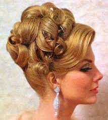 This look is a bit more windblown. Wedding Hairstyles For Long Hair Vintage Updo Vintage Hairstyles Retro Wedding Hair