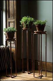 This tall black metal plant stand is the. Metal Plant Stands Indoor Ideas On Foter