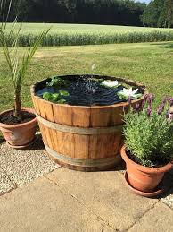 Wine Barrel Planter Mini Pond Wine Barrel Planter Water Features In The Garden Barrel Planter