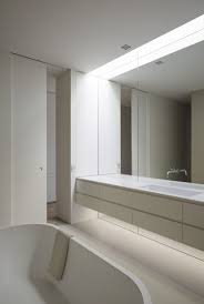 An antique french mirror hangs in the master bath of a farm building turned modern family home in england. Bathroom Mirror Ideas Fill The Wall The Mirror In This Bathroom Reaches The Full Span Of The Bathroom Mirror Design Large Bathroom Mirrors Bathroom Mirror