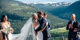 For the bride planning a mountain wedding in the colder months, a long sleeve dress option is a perfect choice. Erin Andrews And Jarret Stoll S Wedding In The Mountains Erin Andrews And Jarret Stoll Wedding Photos