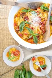 Spaghetti Squash With Cherry Tomato Basil Sauce Theglitterguide Com Recipes Vegetarian Recipes Cooking Recipes