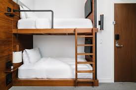 In new york's midtown manhattan area, the tryp hotel offers family room configurations and can sleep a family of 5, 6, 7, or 8! Bunk Room Hotel Room In Midtown Nyc Arlo Nomad Hotel