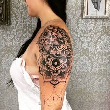 The heart has a floral and jewelry design. Flower Tattoos For Women Shoulder Tattoo Designs Ideas