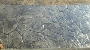 Stamped concrete driveway concrete stone concrete driveways concrete patio dark brown highlights patio plans natural charcoal house front dark colors. Stamped Concrete Using Fieldstone Stamp And Charcoal Release Stamped Concrete Concrete Jackson House