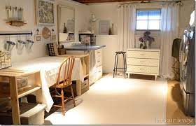 This craft room by @backwoods_farmgirl makes good use of wall space with a large peg board and shelving. Basement Craft Laundry Room Reveal Basement Craft Rooms Laundry Craft Rooms Basement Laundry Room