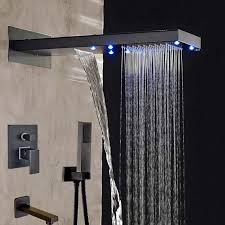 Rain shower heads are meant to fully cover your body in a stream of water that feels like rainfall, which requires the head to be anywhere from 6 to 12 inches wide. Black Finish Wall Mounted Led Waterfall Black Shower Head With Handheld Shower Faucet