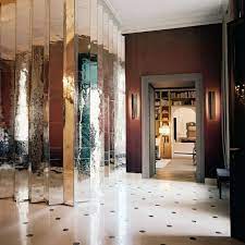 An obvious place is the living area. 10 Rooms With A Mirrored Wall
