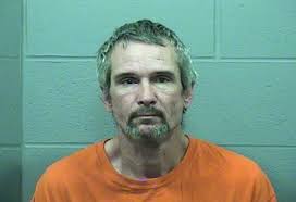 Kan. couple charged in coronavirus coughing prank