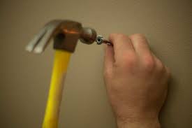 Depending on the context, hanging strings can be a good hanging option, with a great diy look. How To Hang Heavy Things Without Nails Hunker Hanging Pictures Without Nails Hanging Pictures Hanging Heavy Mirror