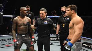 Follow me from a distance! Israel Adesanya Coach Claims Floppy Boob Unrelated To Steroids Not Withstanding Something Accidentally Mmamania Com
