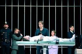A (male) prisoner on death row who is walking to the place of execution. Dead Man Walking