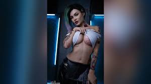 Kalinka Fox cosplays as nude Judy Alvarez from Cyberpunk 2077