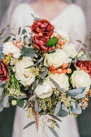 When flowers are ordered before 12:30 p.m. Bohemian Dusty Orange And Rustic Red Wedding Flowers With Sage Foliage Draper In Utah Orange Wedding Flowers Red Wedding Flowers Rustic Red Wedding