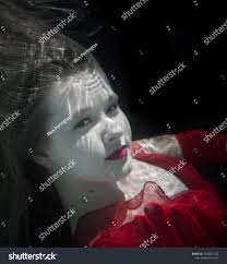 Maddison Powell Underwater Red Dress Stock Photo 1048251793