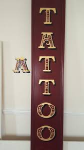 Shop handmade toys and prints. Local Signwriter Hand Painting Sign For A Tattoo Studio Traditional Signs Of London