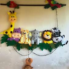 We decided that an accent wall with a jungle theme or animals would be perfect to build the nursery around. Safari Animals Theme Wall Hanging Hanging Mobile Baby Mobile