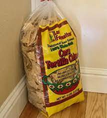 The Gigantic 3 Bag Of Costco Tortilla Chips Has Been Sitting On The Floor In The Corner Of Our Kitchen For Three Weeks I Tortilla Chips Tea Party Food Chips