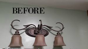 Get inspiration from these light fixture makeovers to get a new look on the cheap. Bathroom Light Fixture Makeover Salvage Sister And Mister