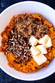 This Bourbon Sweet Potato Casserole Starts With Mashed Sweet Potatoes Butter Pecan In 2020 Sweet Potato Casserole Buttered Sweet Potatoes Sweet Potato Casserole Easy