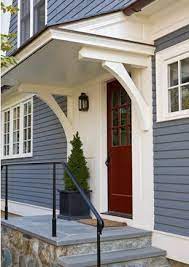covered entry house exterior door overhang house front