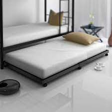 The trundle can be used as an extra sleeping space at night and can be conveniently rolled underneath during the day. 10 Cool Best Trundle Bed Designs With Pictures In 2021